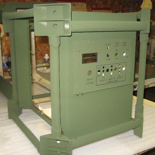 A green box with buttons and a clock on it