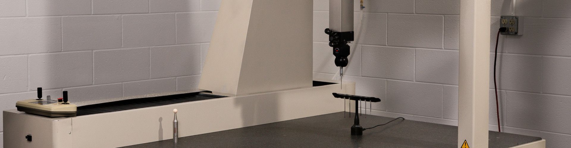 A machine is sitting on top of a table in a room.
