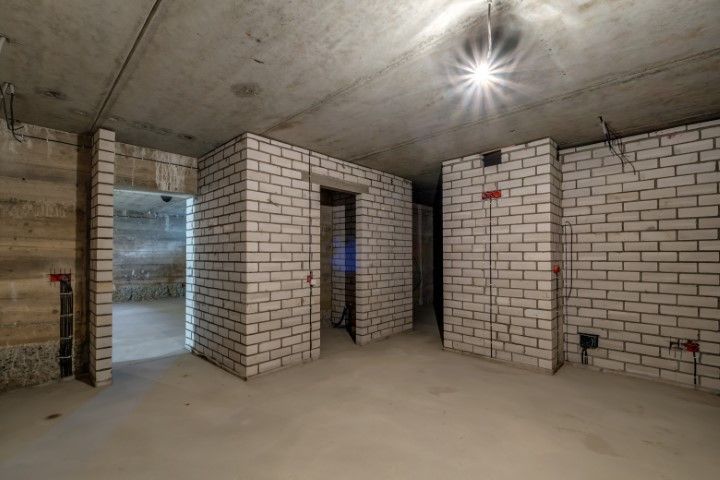 basement with brick walls waterproofed