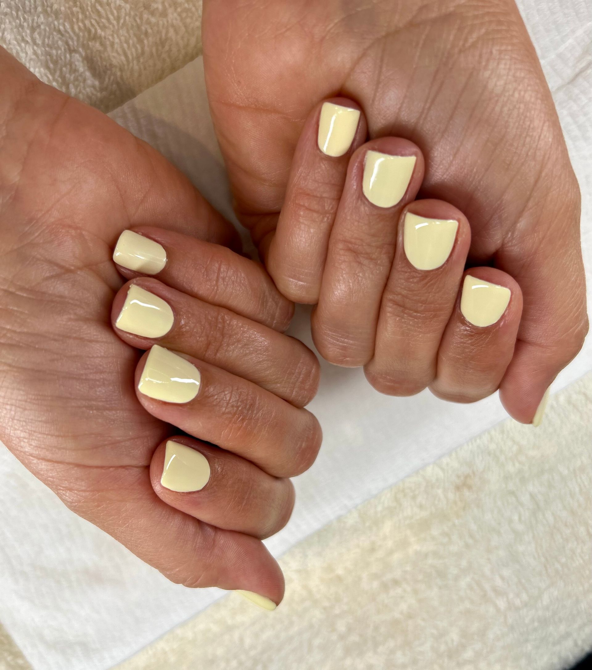 Hands with Dazzle dry nail polish.