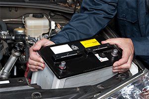 Alternator Problems — Mechanic Replacing Car Battery in Lafayette, IN