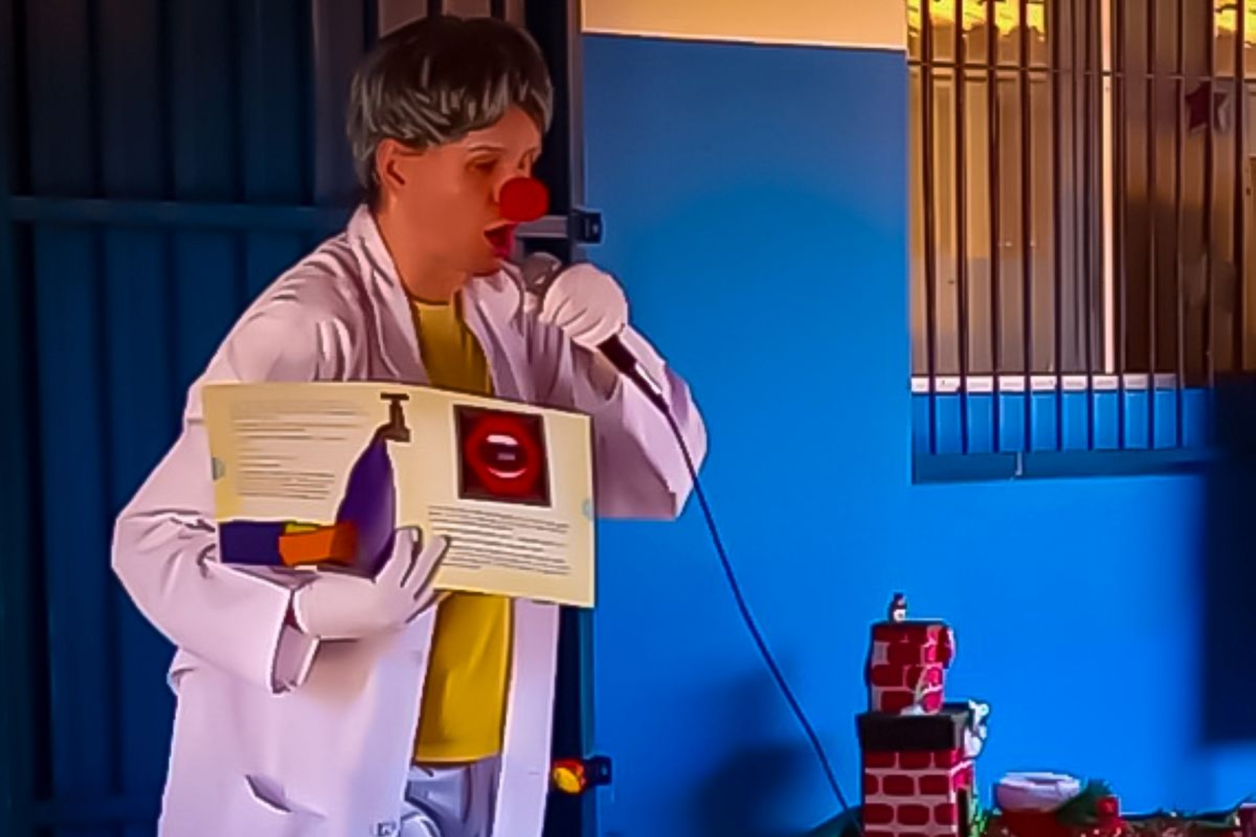 contação de estória do livro “Abre a boca e feche os olhos!”, com o artista Bruno Wan-Dick. 