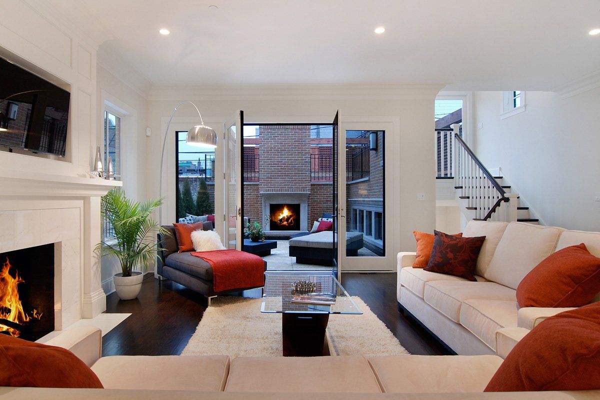 A living room with a fireplace and a couch