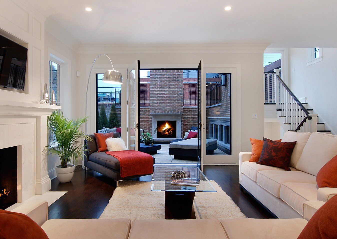 A living room with a fireplace and a couch