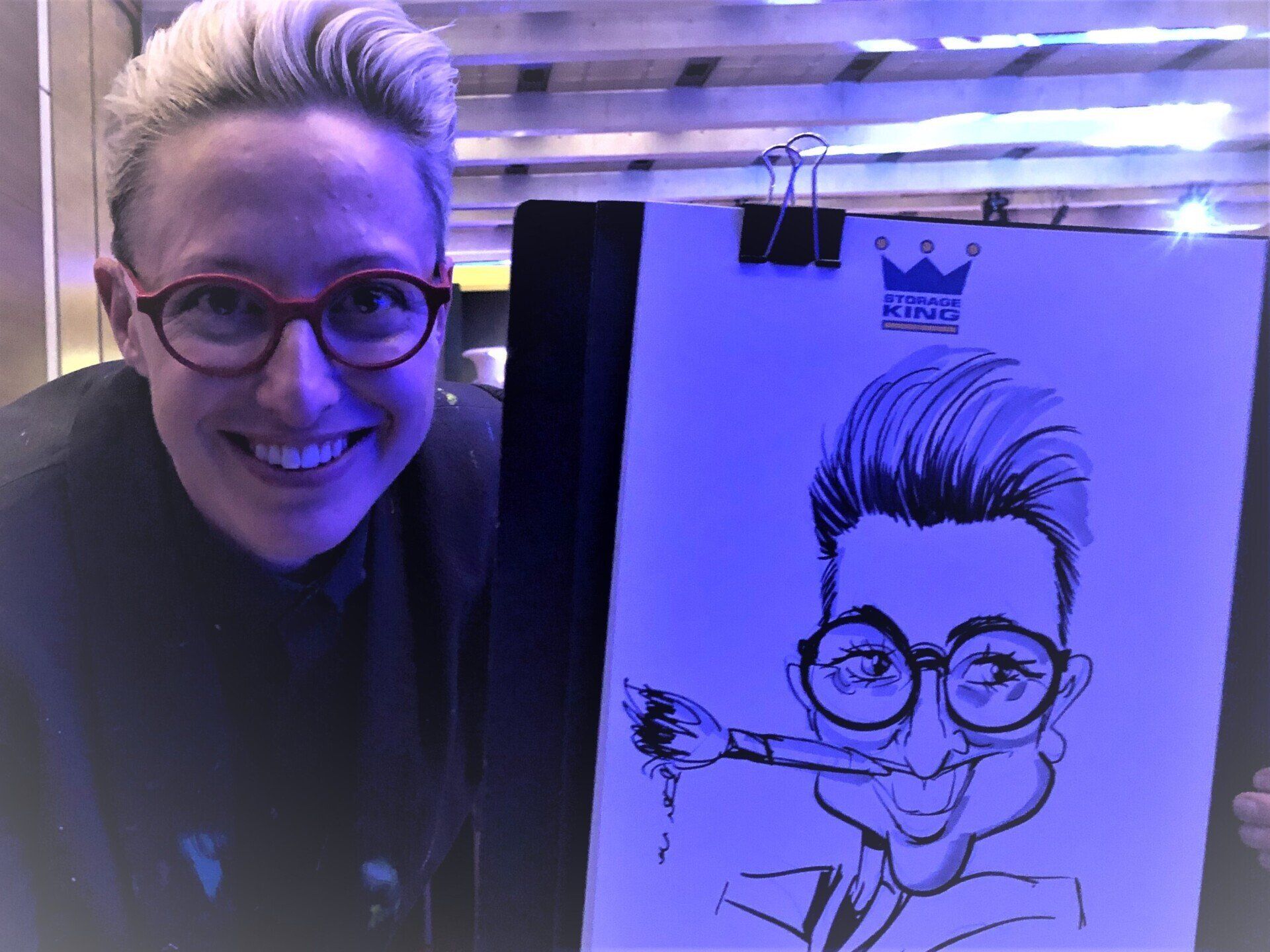 Event hire cartoonist David Green drawing live caricatures at events.
