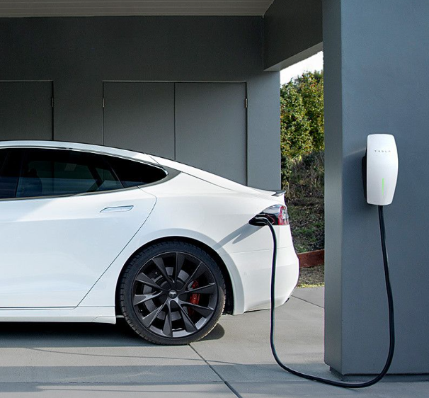 Telsa EV charger connected to a tesla car