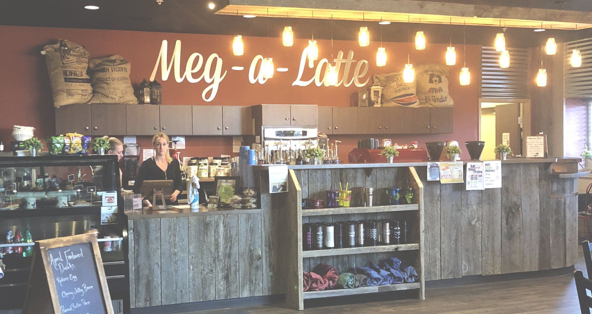 Woman standing behind the counter