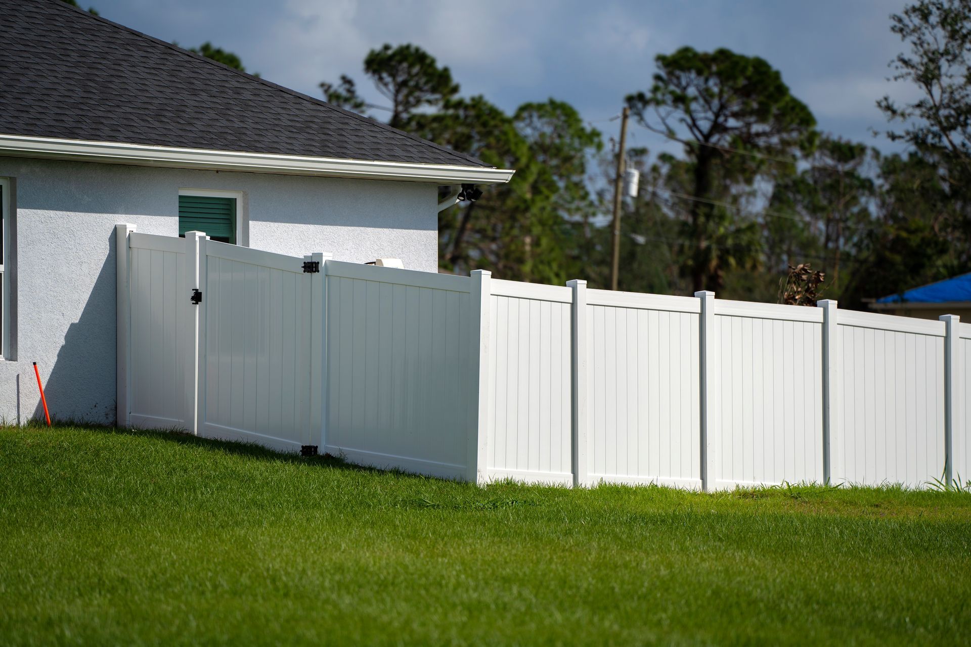 Recently build white vinyl fence