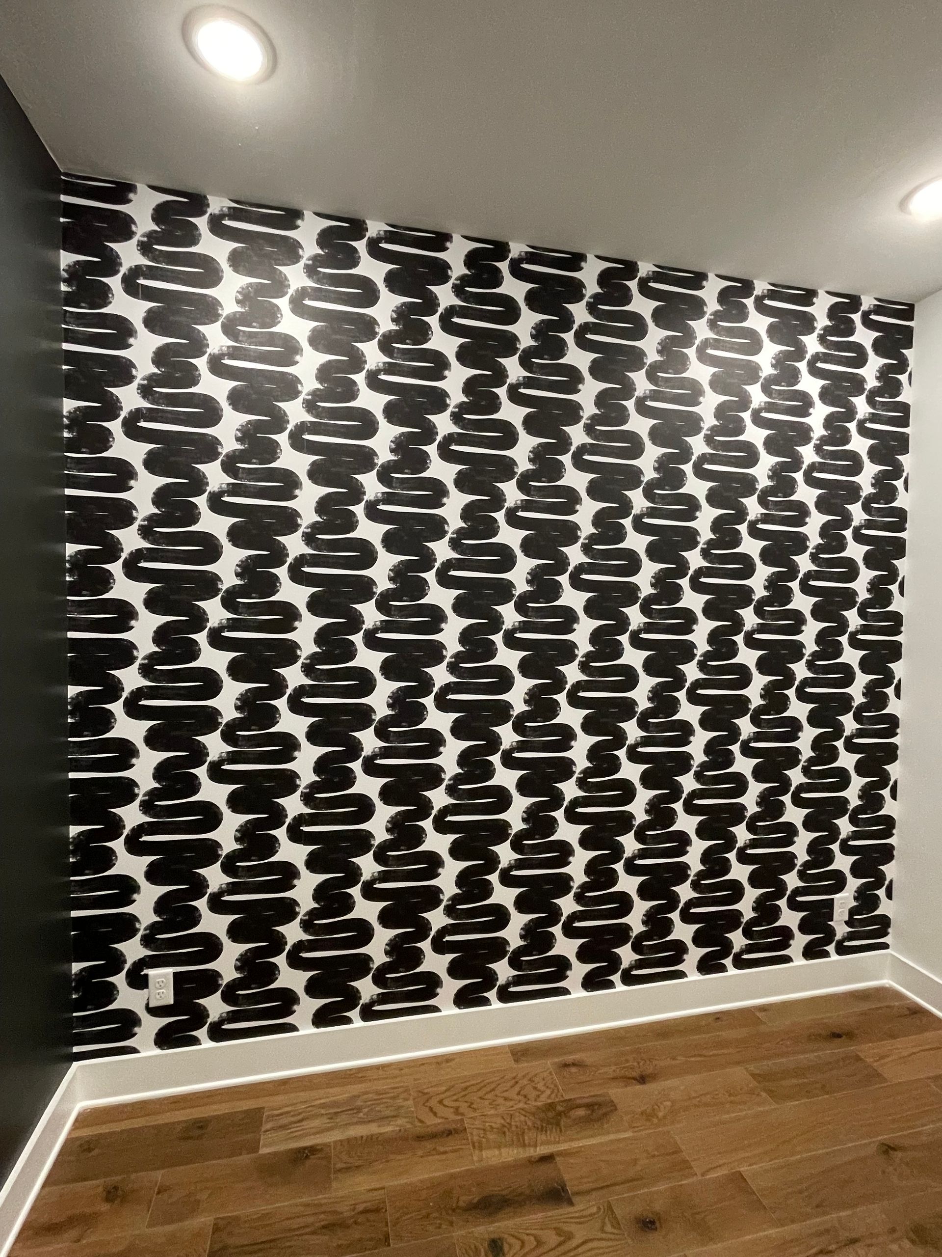 A wall with a black and white pattern on it in Nashville, TN