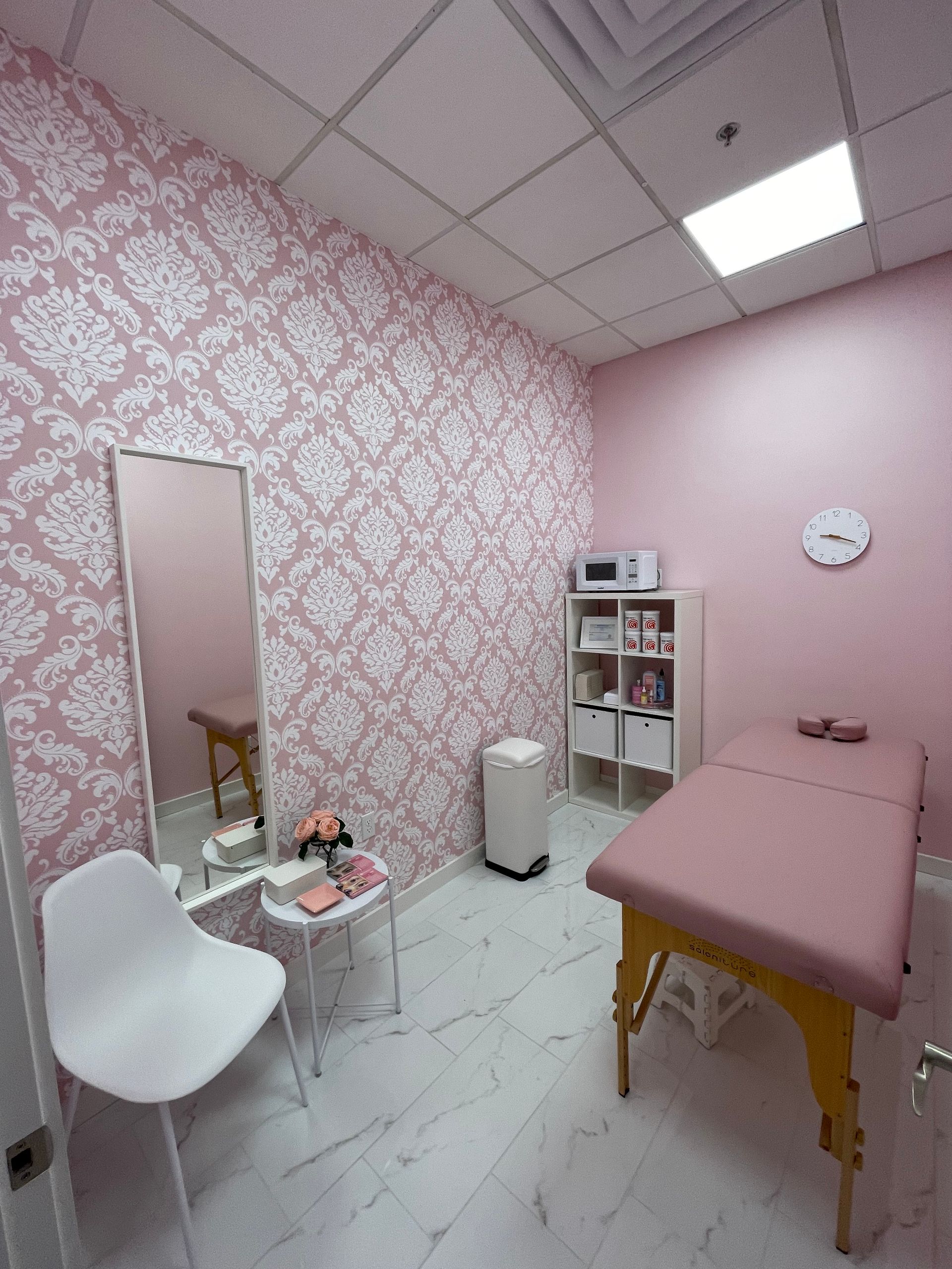 A room with pink walls and a pink bed in Nashville, TN