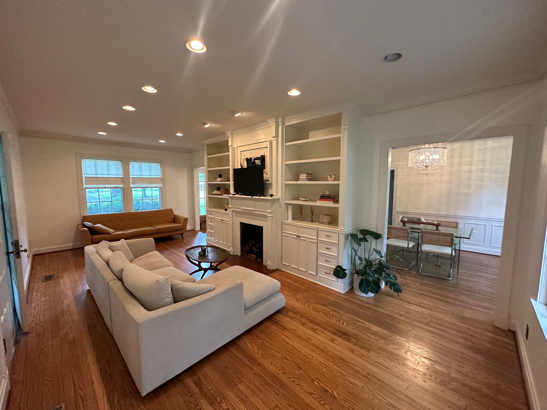 A living room filled with furniture and a fireplace in Nashville, TN