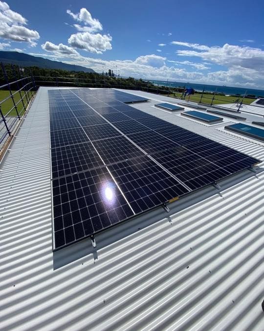 A Roof With A Lot Of Solar Panels On It — Solarblu Pty Ltd In Woonona, NSW