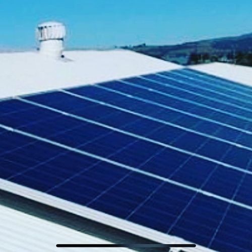 There Are Many Solar Panels on the Roof of a Building — Solarblu Pty Ltd in Kangaroo Valley, NSW