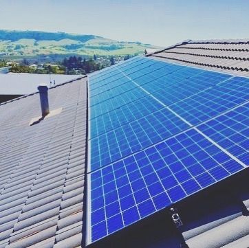 A Roof With a Lot of Solar Panels on It — Solarblu Pty Ltd in Kangaroo Valley, NSW