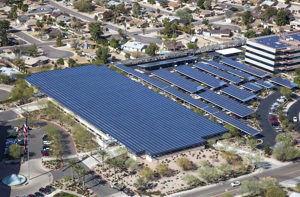 An Aerial View Of A Building With A Lot Of Solar Panels On The Roof — Solarblu Pty Ltd In Kiama, NSW