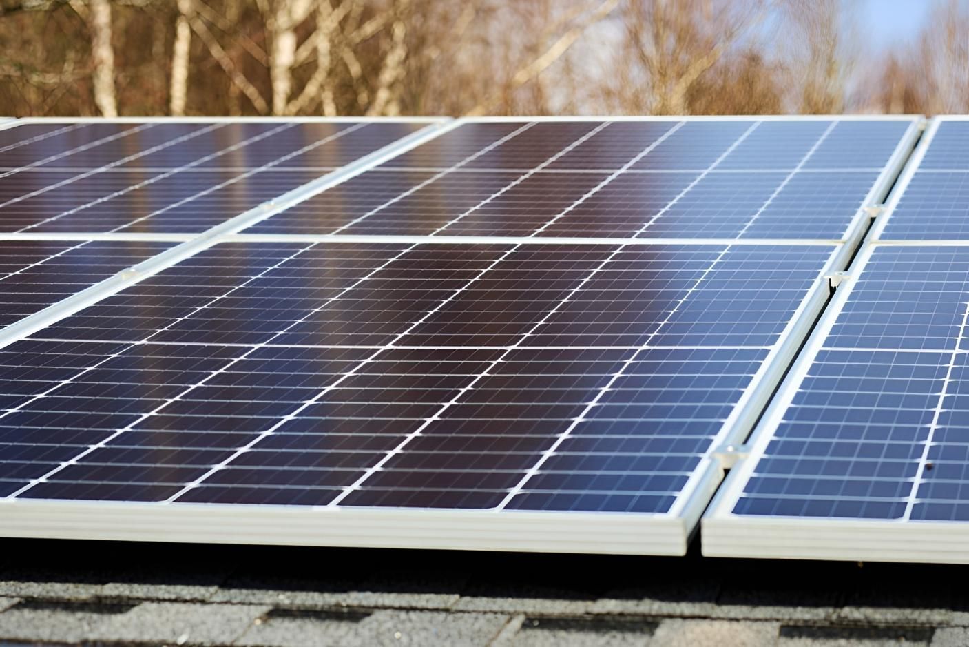 Solar Panels on a Rooftop, Absorbing Sunlight — Solarblu Pty Ltd In Dapto, NSW