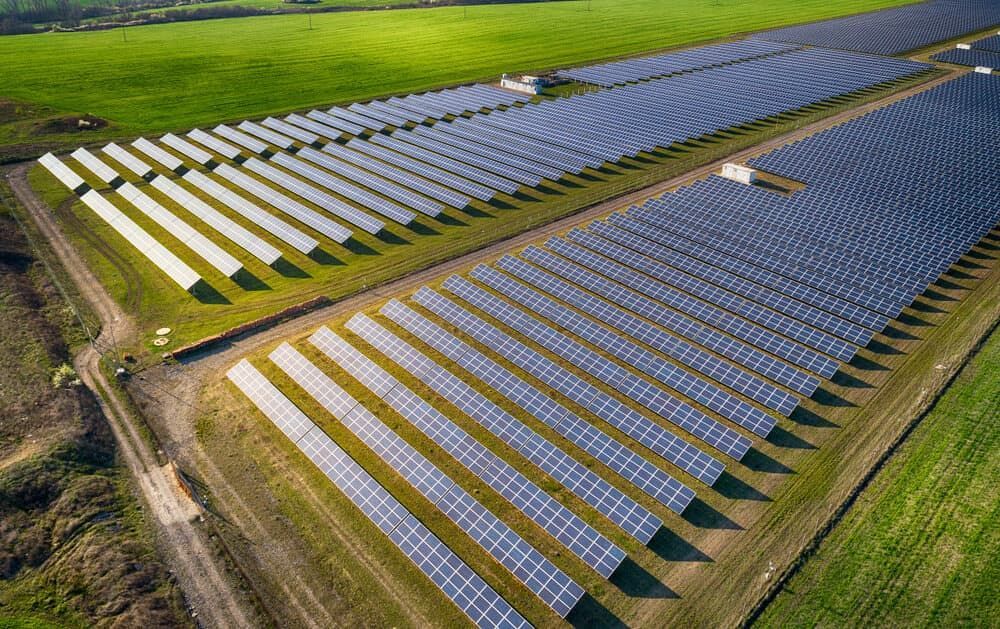 An Aerial View Of A Large Solar Farm In A Field — Solarblu Pty Ltd In Bowral, NSW