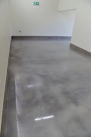 A Room With a Shiny Concrete Floor and White Walls  — NHM Painting & Projects Pty Ltd in Ciccone, NT