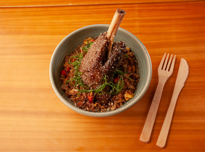 Brick church with a yellow bus, text reads 