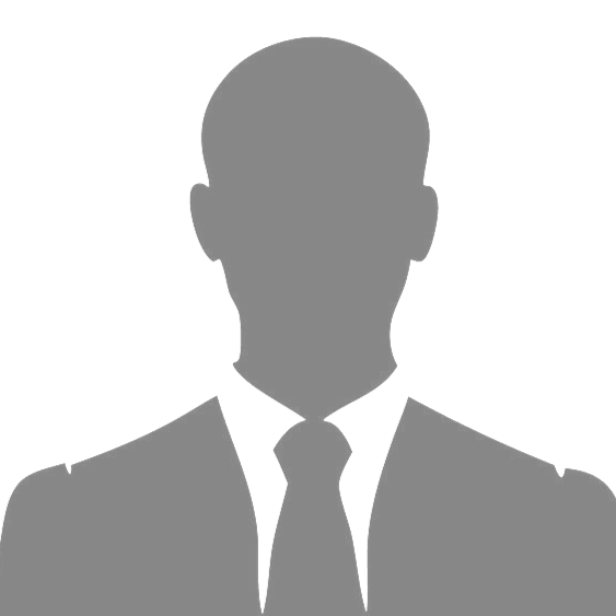 Silhouette of a person in a suit and tie, head and shoulders.