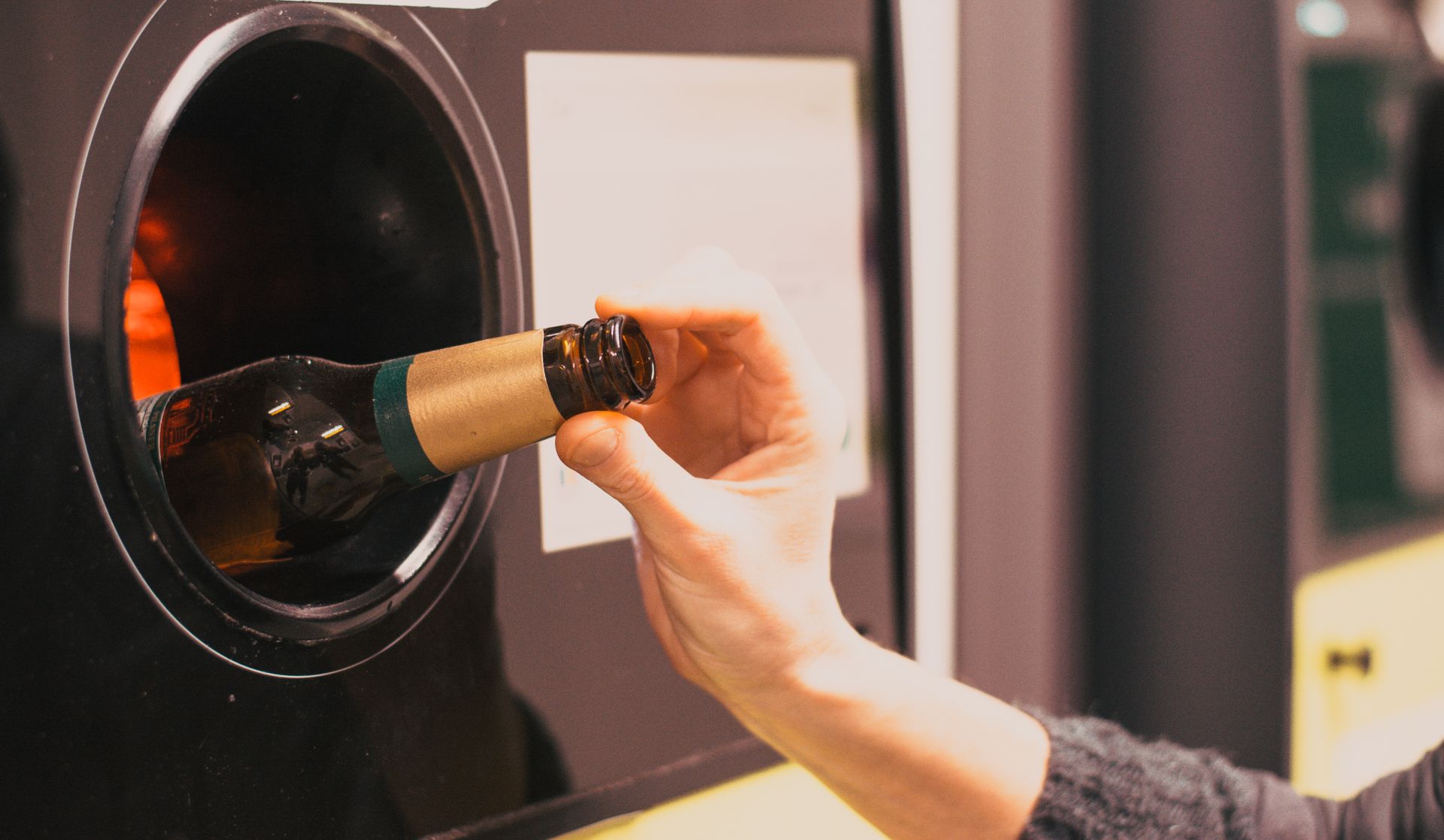 An electronic disposal and recycling machine is used for responsible waste management.