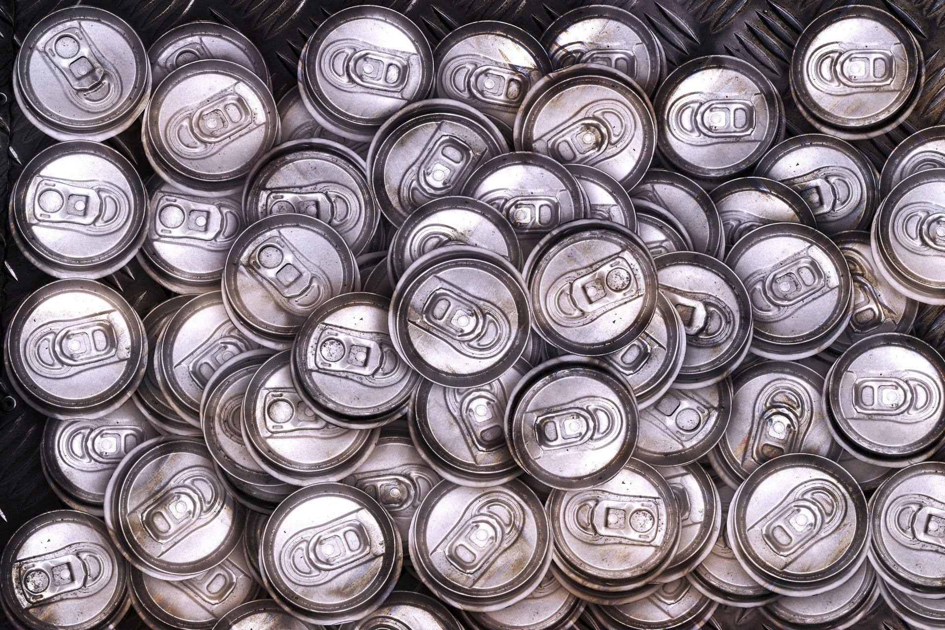 Pile of soda cans.