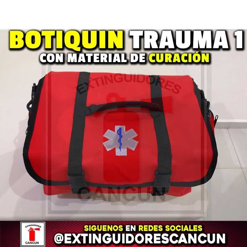 A red bag that says botiquin trauma con material de curacion