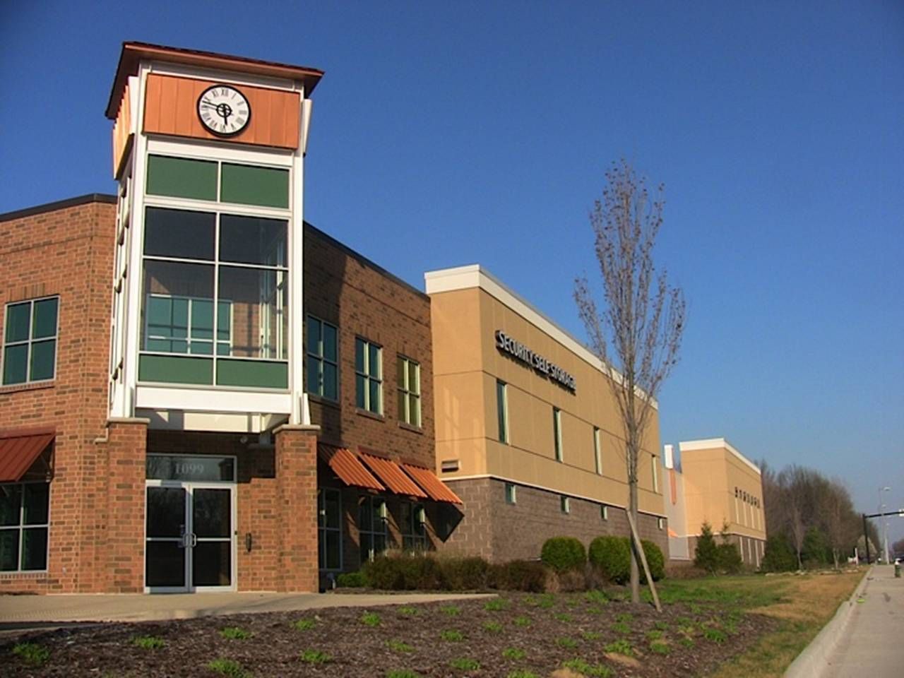 A large building with a clock on top of it