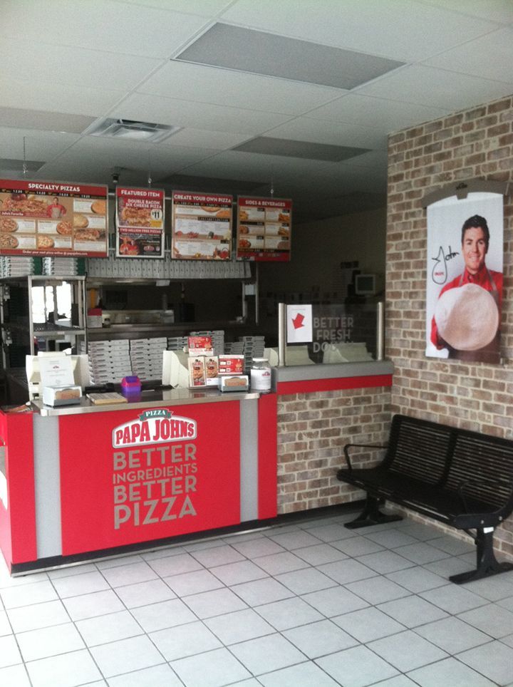 The inside of a papa john 's pizza restaurant