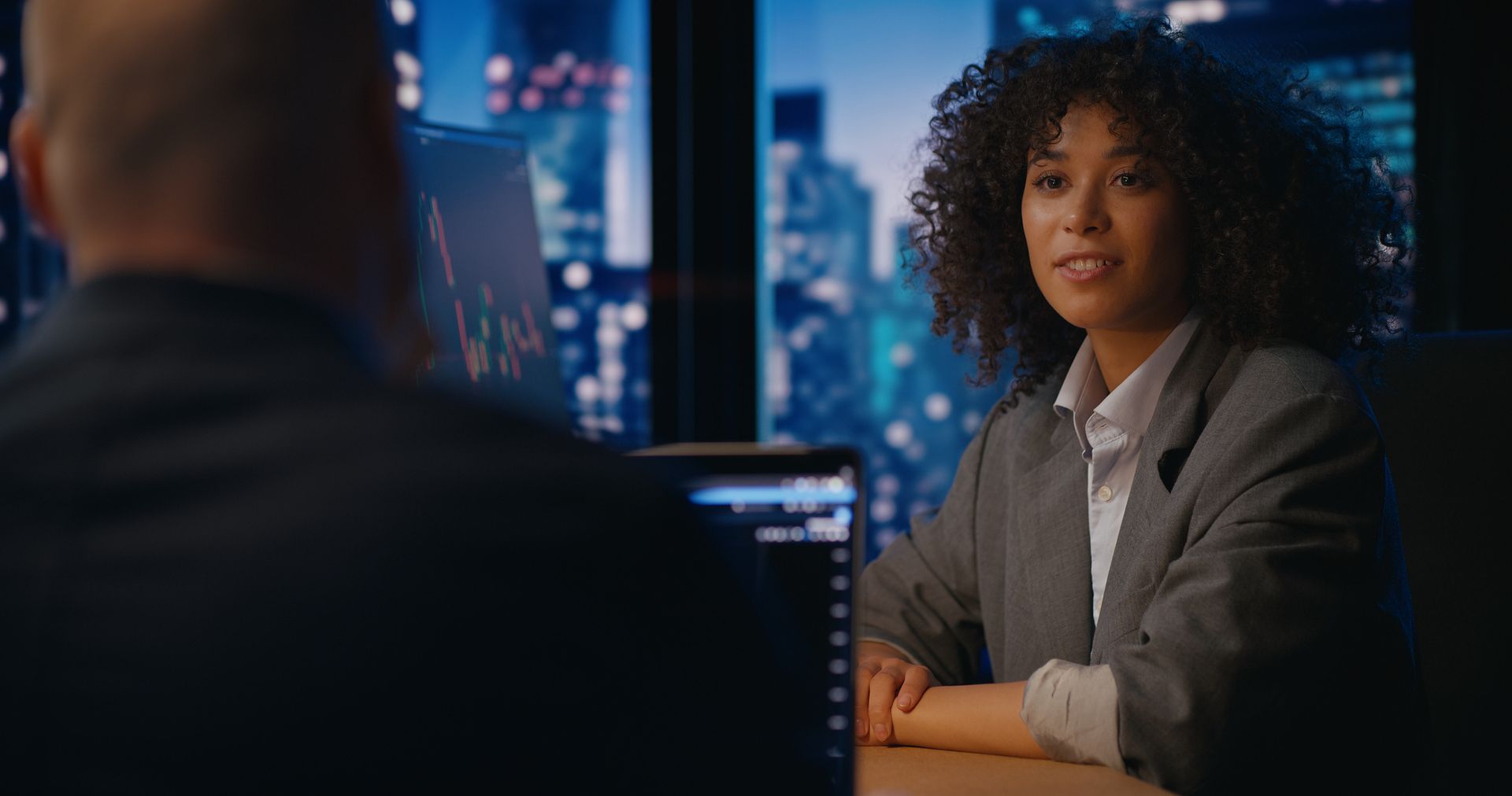 Business brokers observe and analyze stock market charts and develop investment strategies.