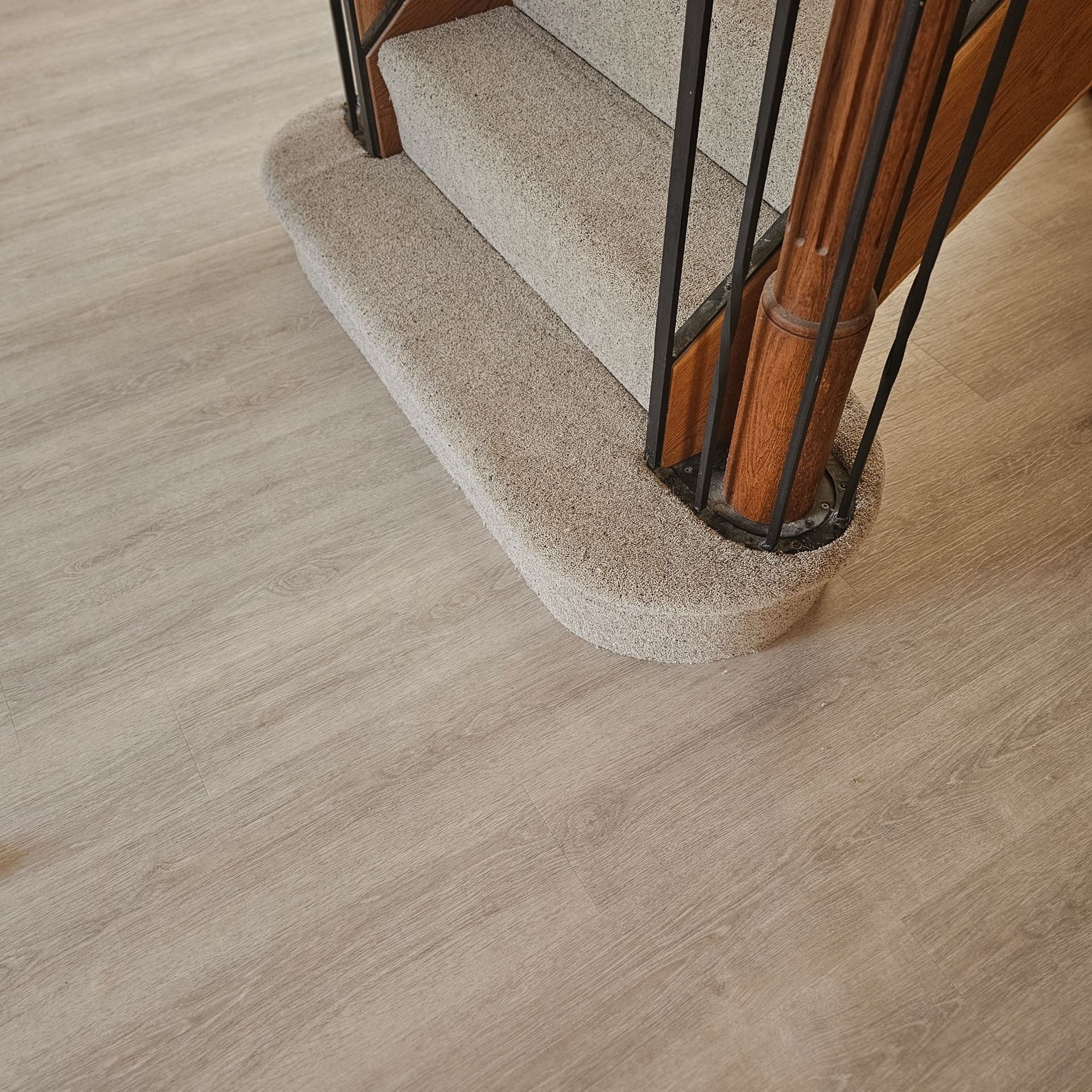 Amtico flooring in living space with Penthouse carpet on stairs, Kingsbridge