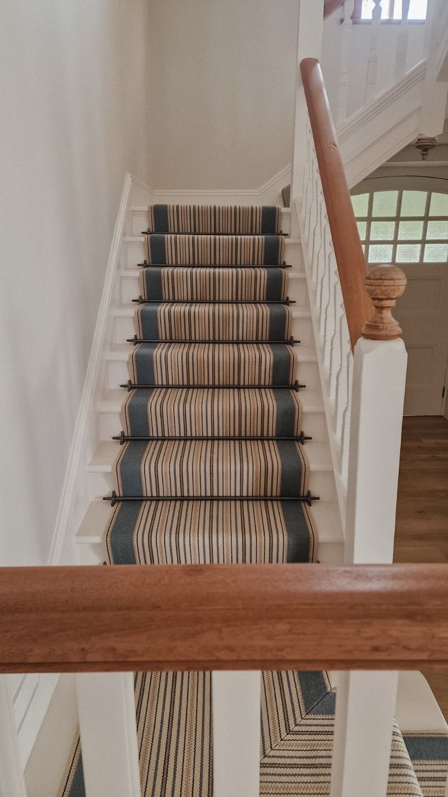 Roger Oates runner on white stairs in South Hams 