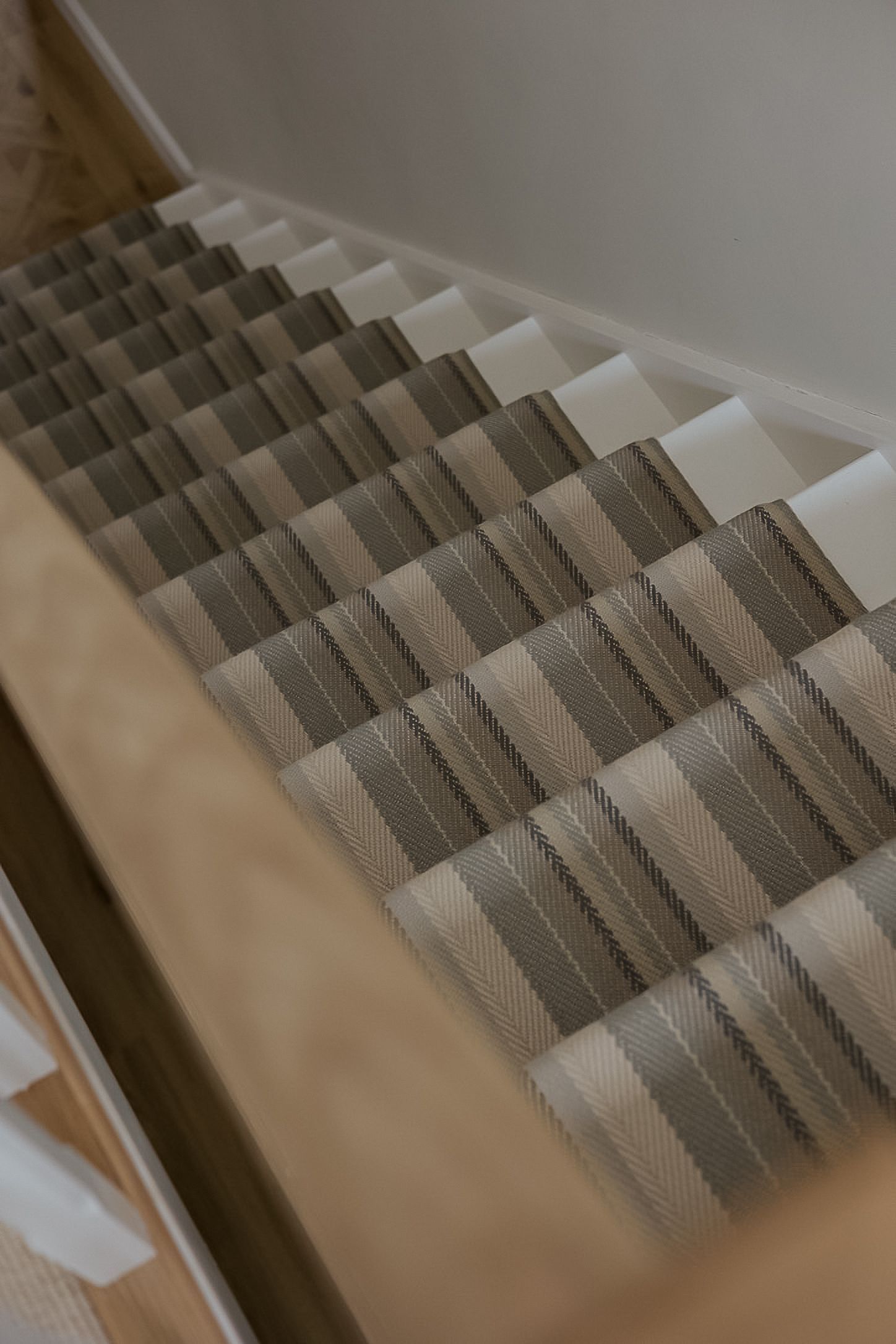 Roger Oates Runner on straight stairs in Topsham, Exeter