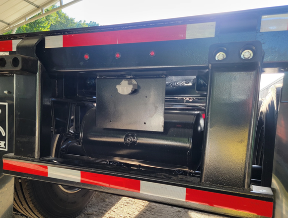 Ventilation grate set in a metal wall.