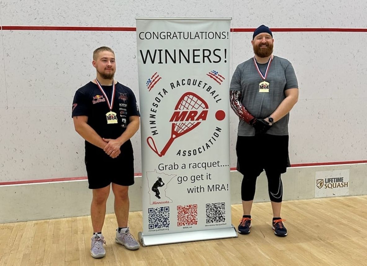 Ryan's teammate Boyington Kassa (left) and Ryan Sullivan (right) after winning Minnesota State Men's A doubles title