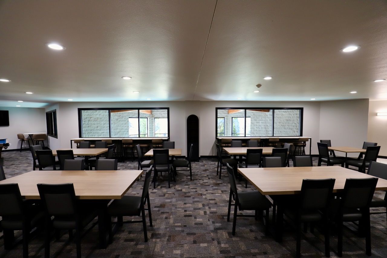 Updated seating and flooring in the Community Room at Dakota Park