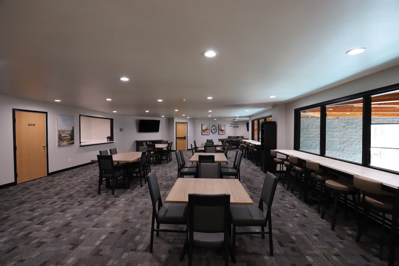 Updated seating and flooring in the Community Room at Dakota Park