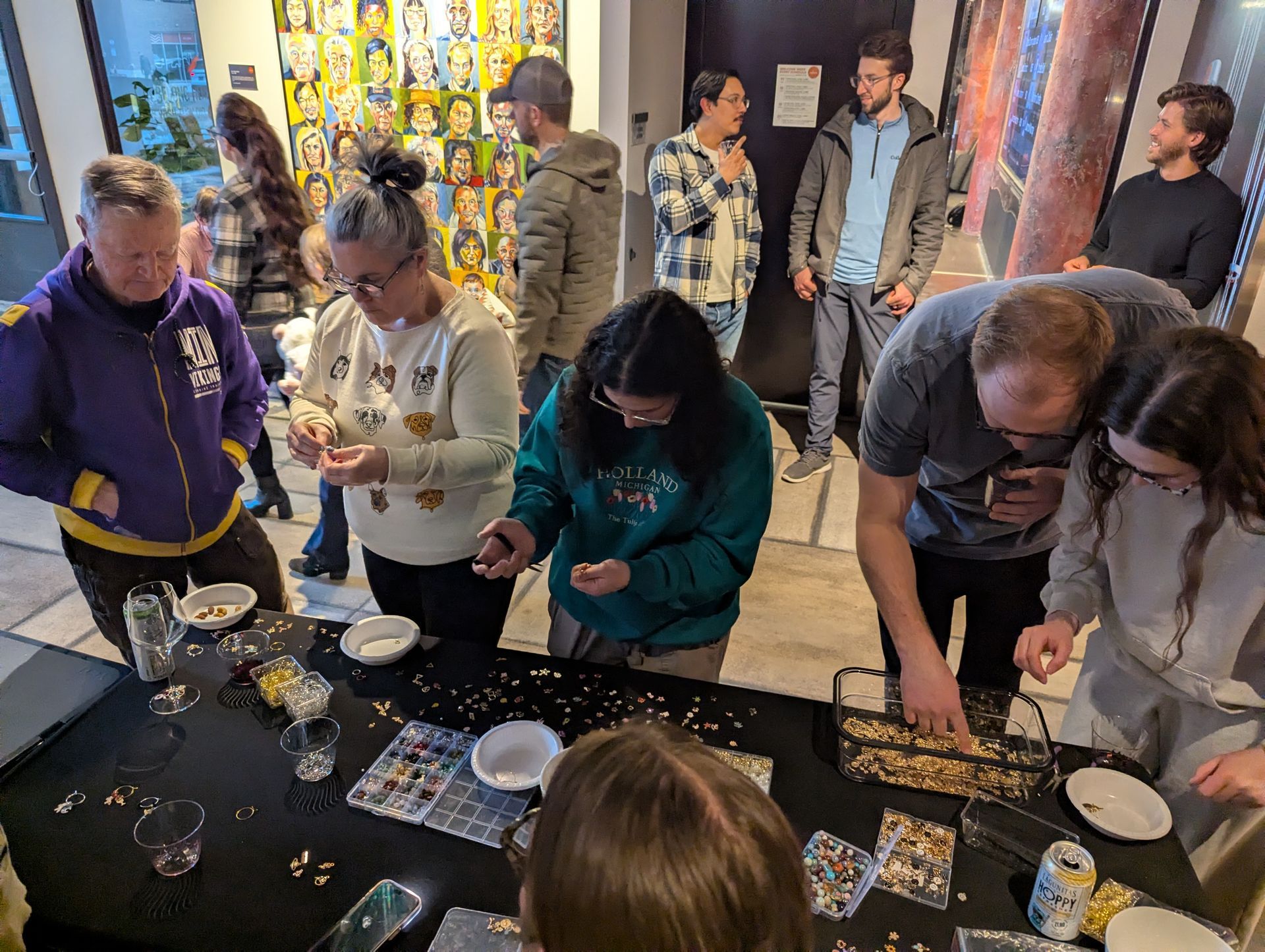 Copham residents make wine glass charms during Wine Down Wednesday