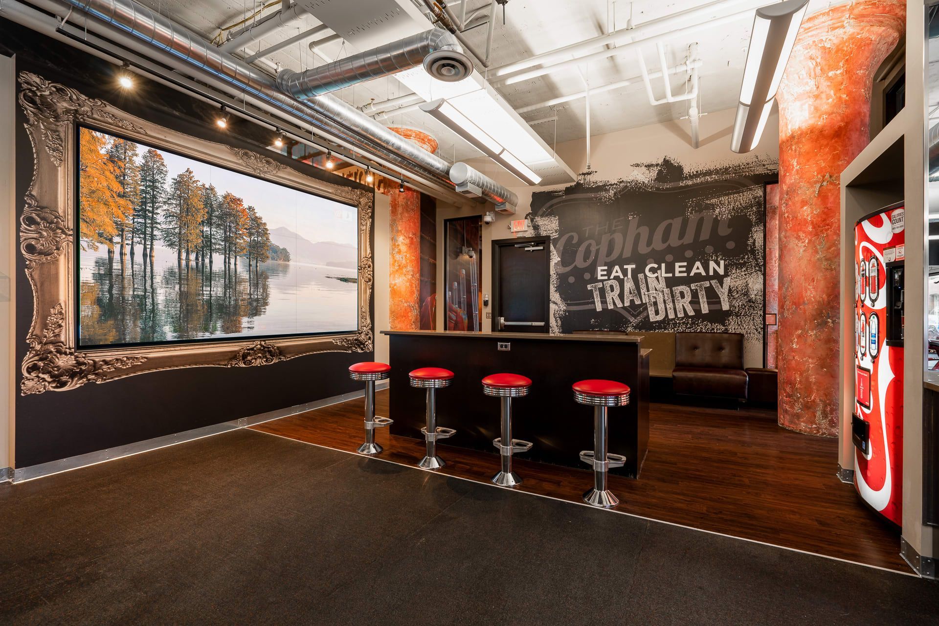 A well appointed fitness center includes a post workout lounge