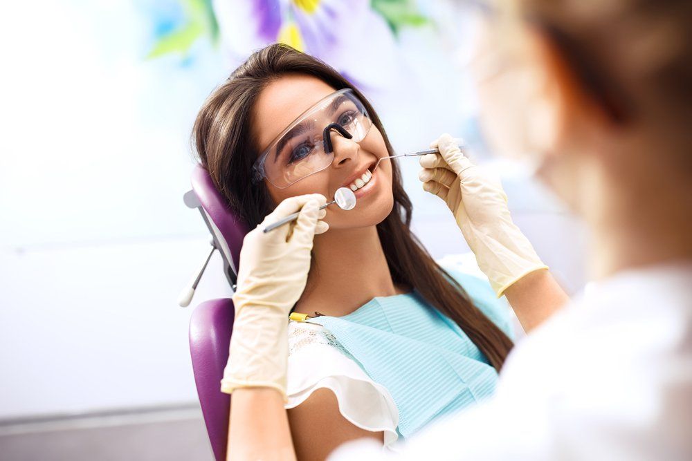 Girl at The Dentist Getting Her Teeth Checked — Andover, MN — Round Lake Dental