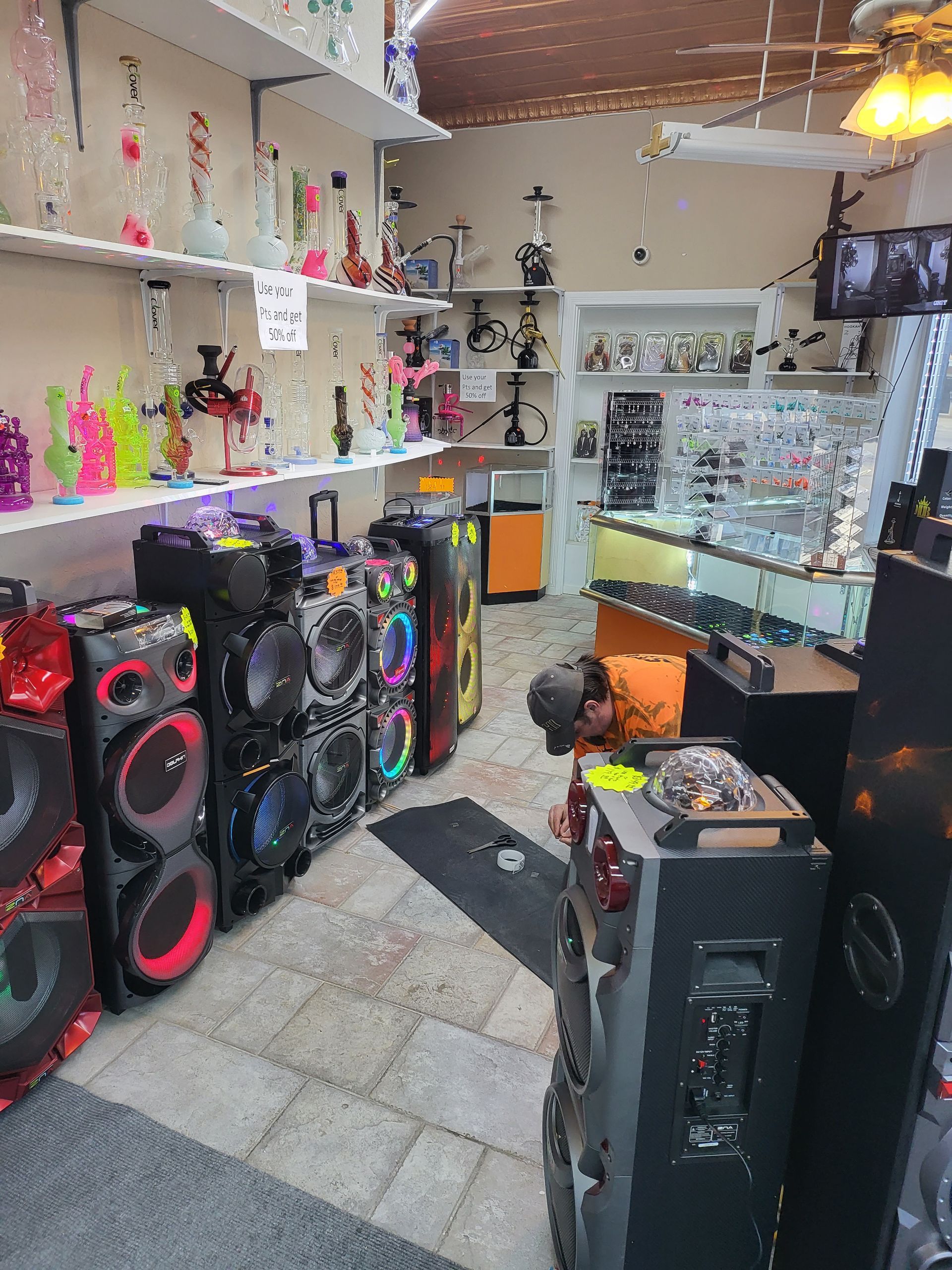 A store filled with lots of speakers and hookahs.