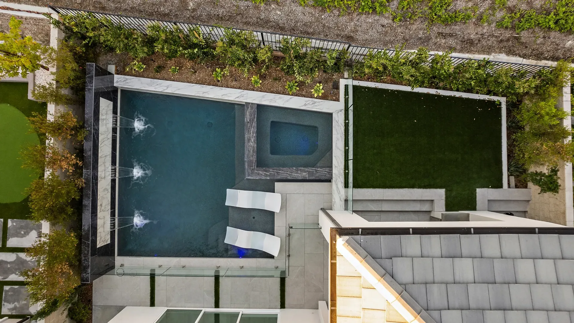 Small but luxurious pool and spa designed and built in small space by Westmod