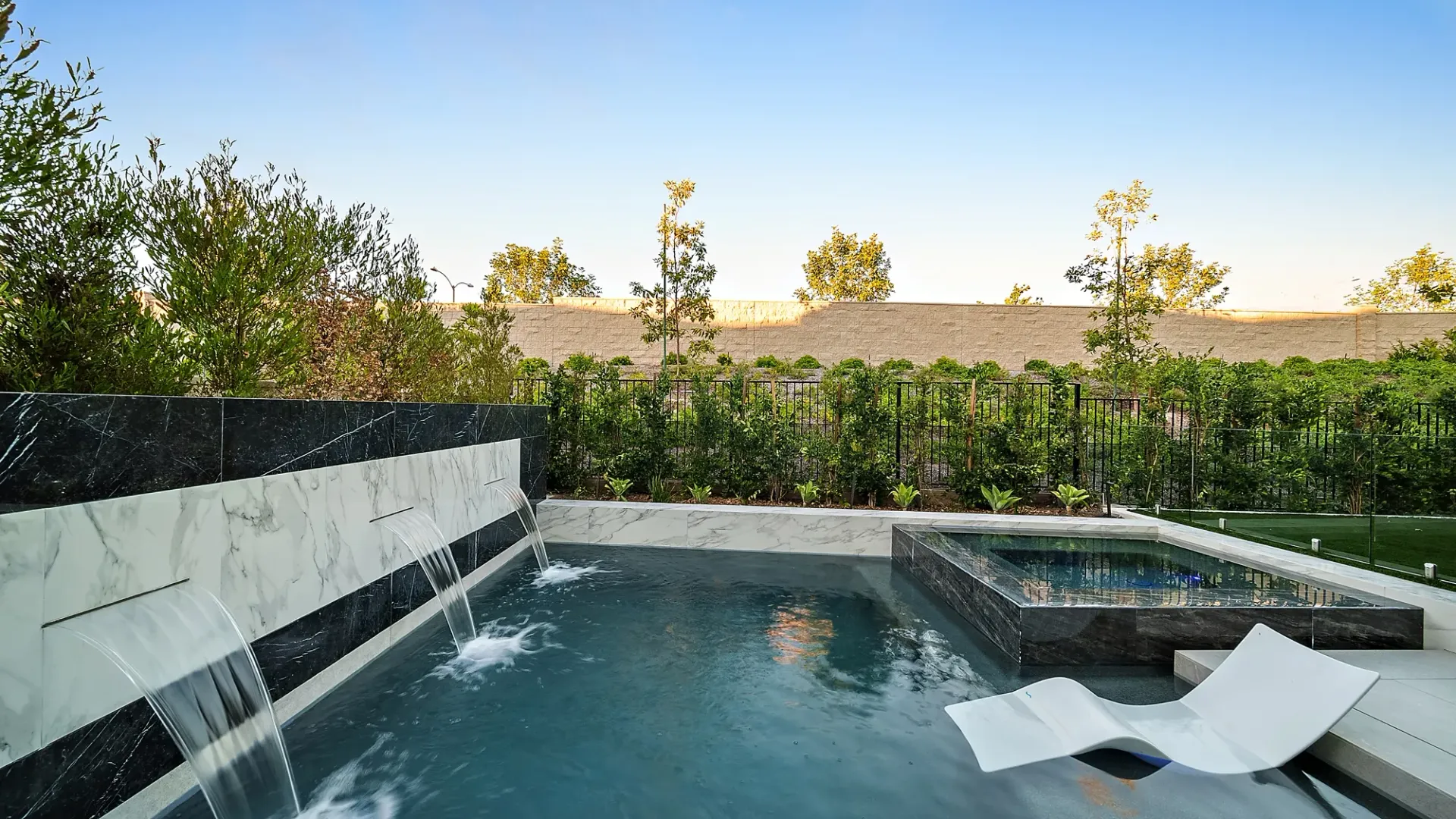 Small but luxurious pool and spa designed and built in small space by Westmod