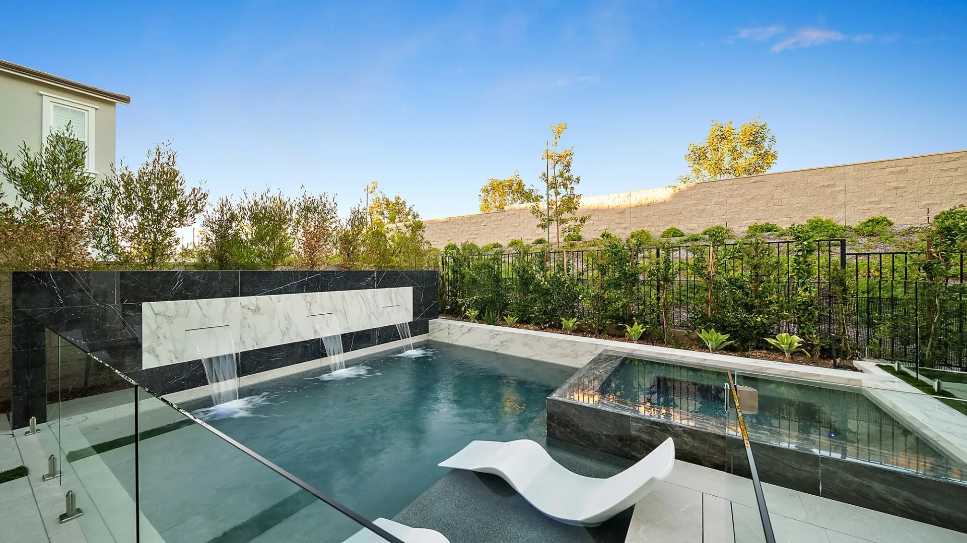 Small but luxurious pool and spa designed and built in small space by Westmod