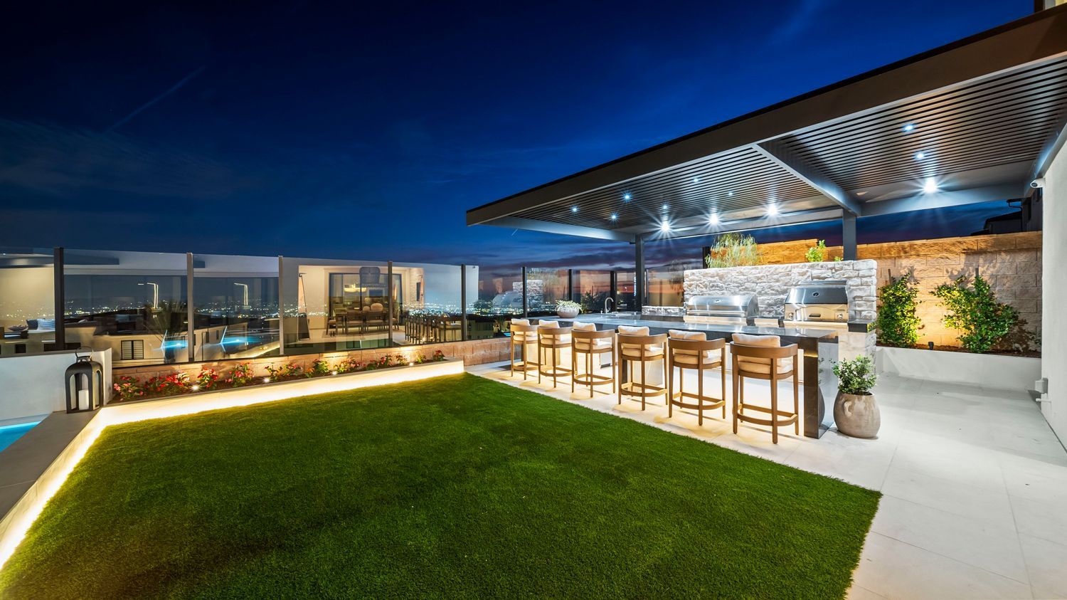 Luxury pool and outdoor living space designed and built by Westmod in Porter Ranch, CA.