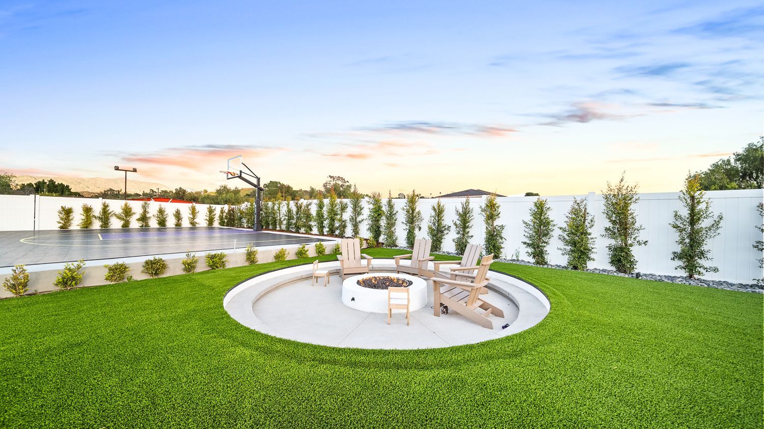 Custom pool and outdoor living project complete with a full court basketball court and outdoor kitchen. Project by Westmod. Location = Santa Clarita, CA.