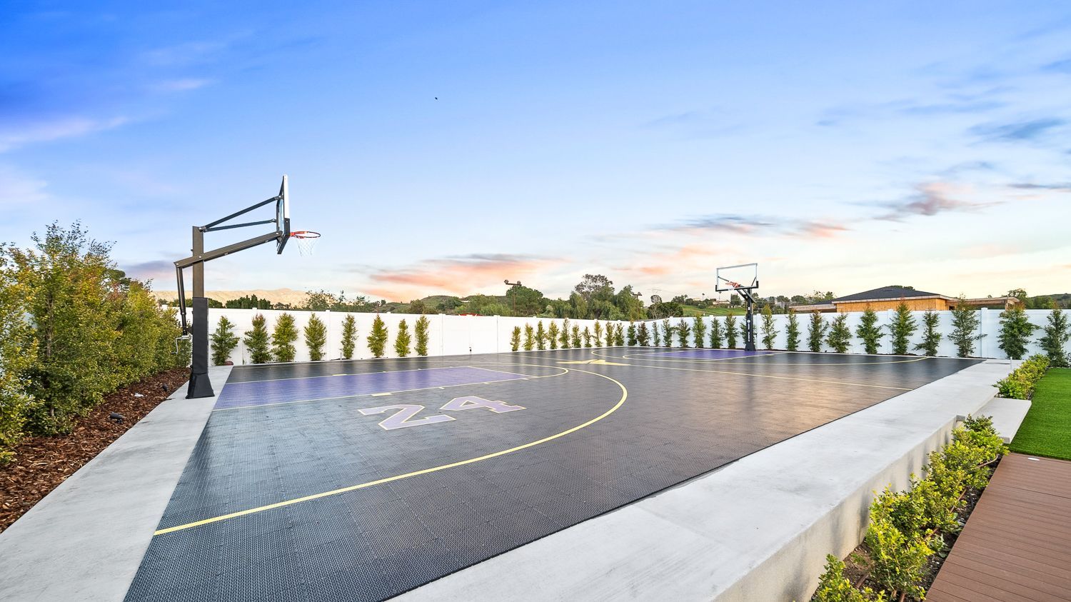 Custom pool and outdoor living project complete with a full court basketball court and outdoor kitchen. Project by Westmod. Location = Santa Clarita, CA.