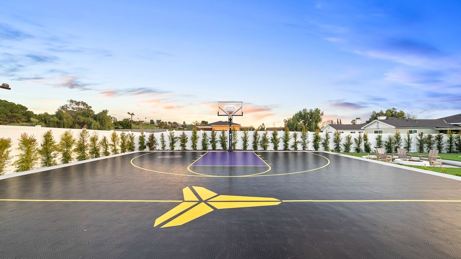Custom pool and outdoor living project complete with a full court basketball court and outdoor kitchen. Project by Westmod. Location = Santa Clarita, CA.