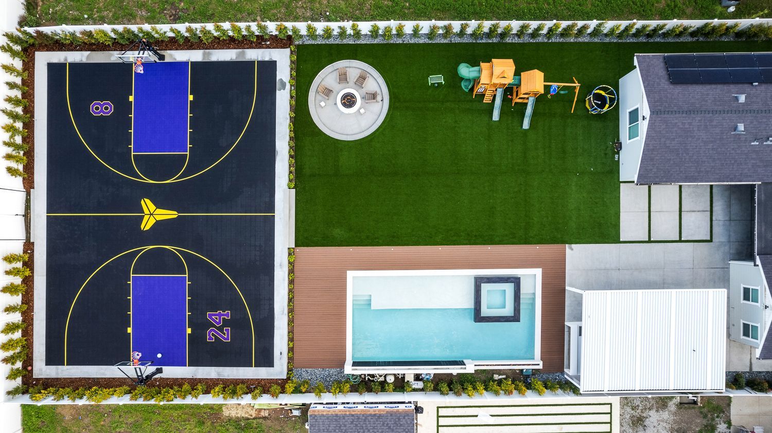 Custom pool and outdoor living project complete with a full court basketball court and outdoor kitchen. Project by Westmod. Location = Santa Clarita, CA.