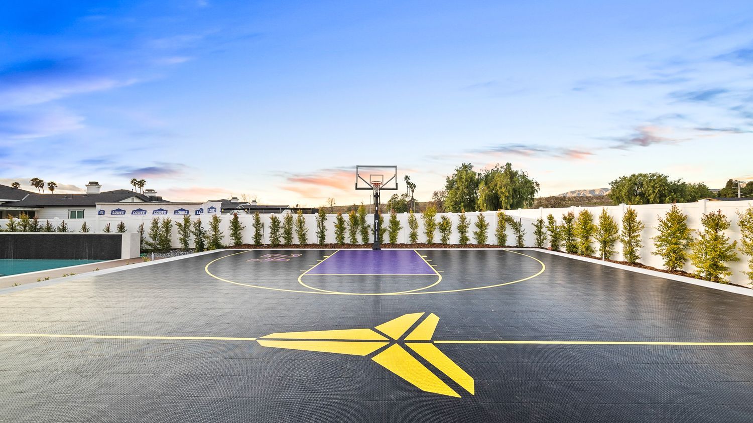 Custom pool and outdoor living project complete with a full court basketball court and outdoor kitchen. Project by Westmod. Location = Santa Clarita, CA.